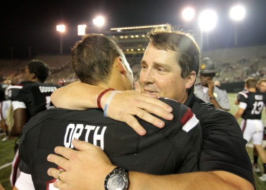South Carolina's Perry Orth and head coach Will Muschamp celebrate beating Vanderbilt in Nashville, Tenn. on Thursday, Sept. 1, 2016. (Travis Bell/SIDELINE CAROLINA)